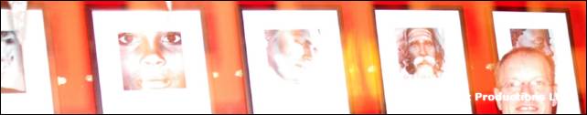 A strip of framed portrait pictures on a red wall with a bald man at the right edge