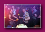 Small framed thumbnail of people in a dark club