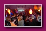 Small framed thumbnail of a crowded club with orange flame effects