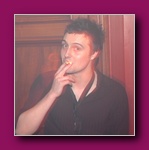 Small framed thumbnail of a man in a dark top holding a cigarette to his mouth
