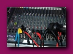 Small thumbnail of a mixing desk with cables plugged in