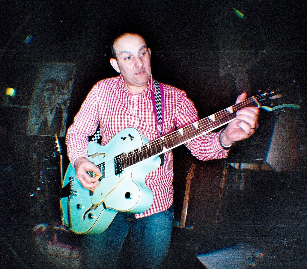 A man with a nice guitar