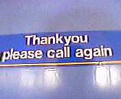 Sign reading Thankyou please call again on a blue background