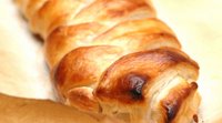 Close-up of a golden baked plaited pastry
